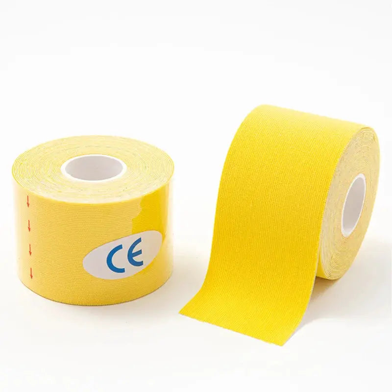 Simples Market kinesiology tape rolls, yellow elastic athletic tape for knee support, two rolls shown