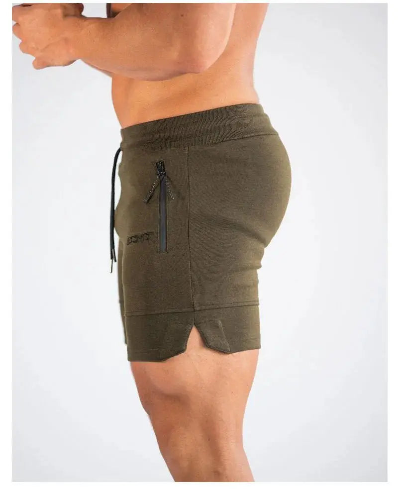 Men's olive green gym shorts with zip pocket, drawstring waist and side vented hem