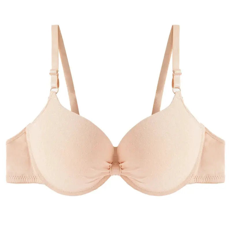 Women's beige push-up underwire bra with bow detail and adjustable straps