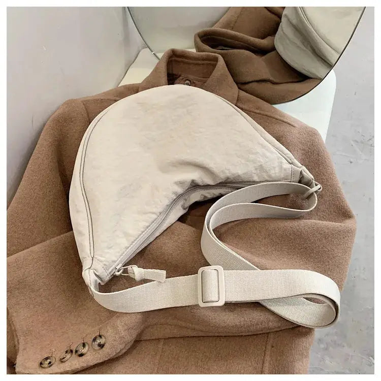 Simples Market nylon hobo crossbody bag in beige with adjustable strap; large-capacity tote