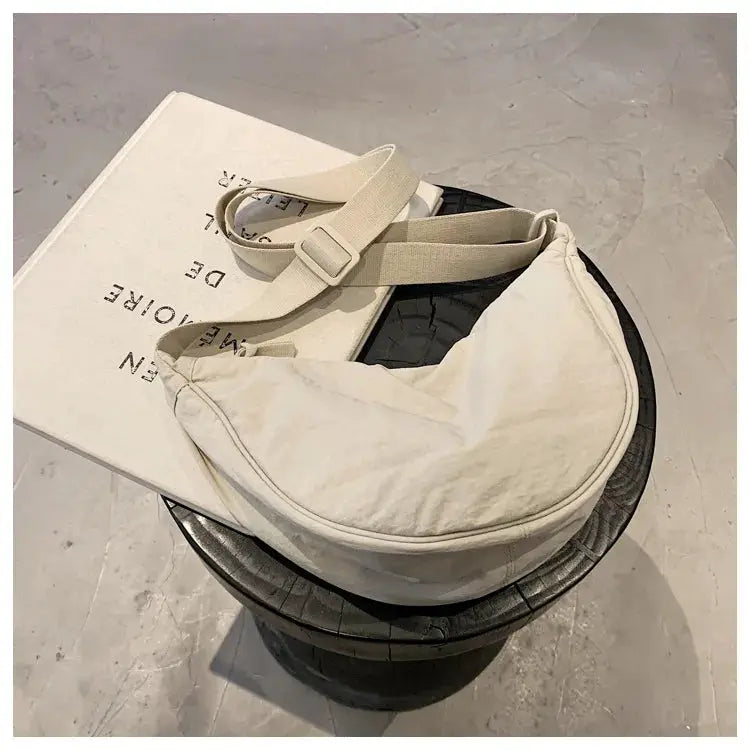 Simples Market casual nylon hobo crossbody bag in off-white with beige strap, large-capacity tote.