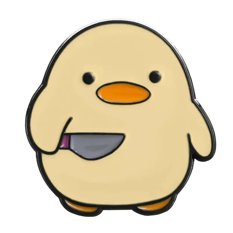 Cartoon penguin enamel pin brooch; beige body with orange beak and feet.