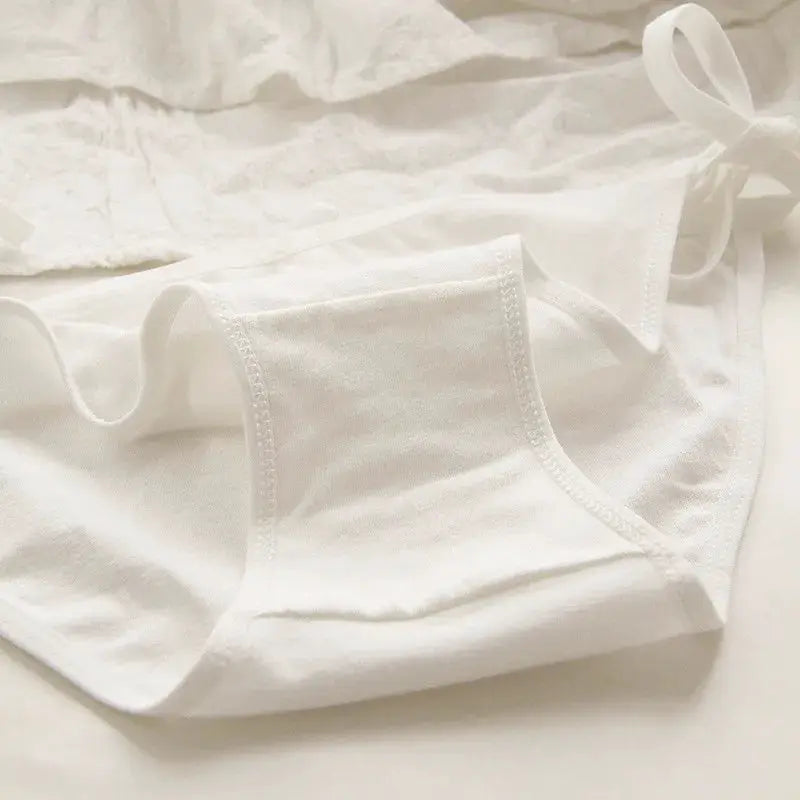 Alluring lace-up briefs with side bows in white, low-waist underwear
