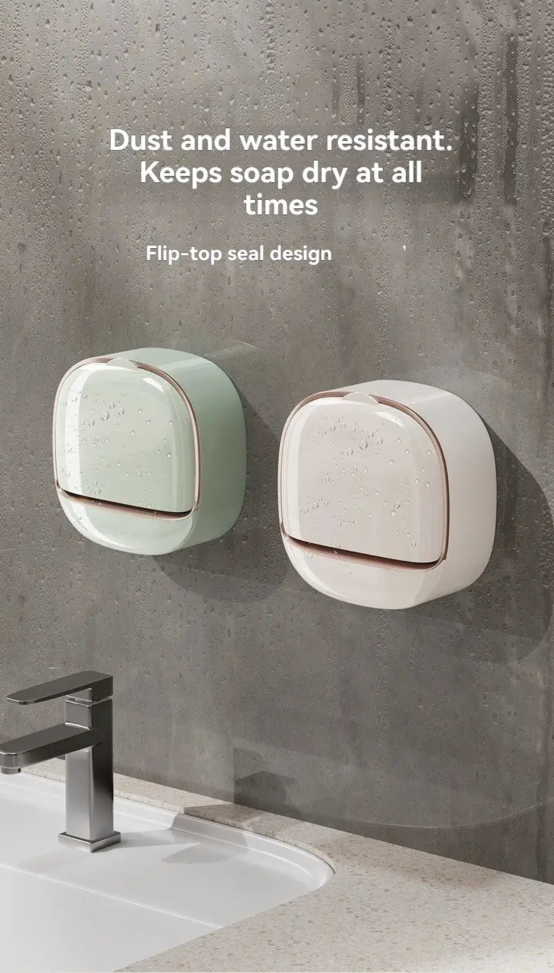 Two waterproof hanging soap boxes in pastel mint green and white with flip-top lids, mounted on a bathroom wall.