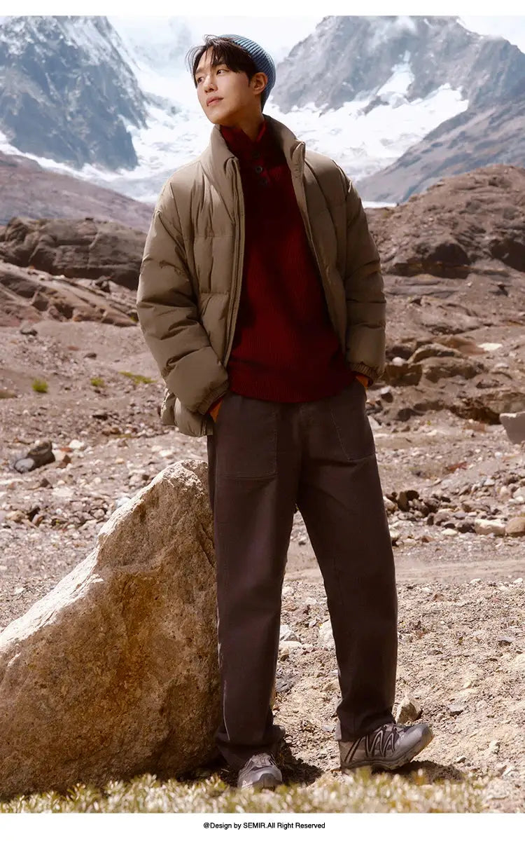 Semir down jacket in tan, men's puffer outerwear for winter in rugged mountain scenery