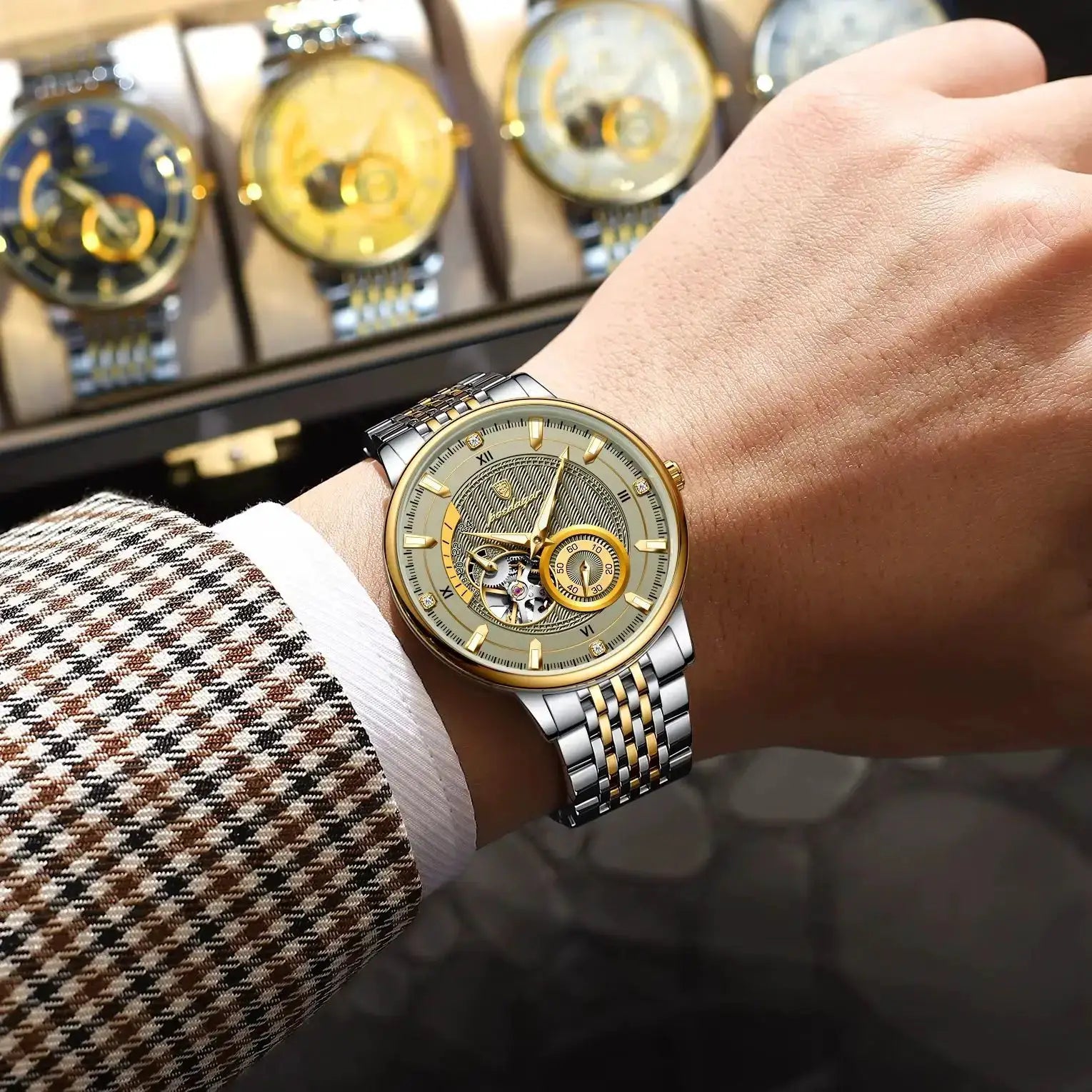 POEDAGAR luxury men's wristwatch with two-tone stainless steel band and gold bezel, skeleton dial.