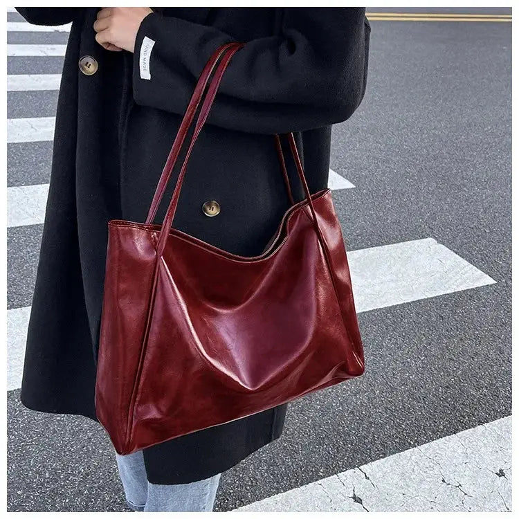 Women's red PU leather tote bag by Simples Market with long shoulder straps, large capacity