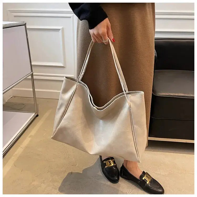 Women beige tote bag in soft PU leather with large capacity and dual shoulder handles