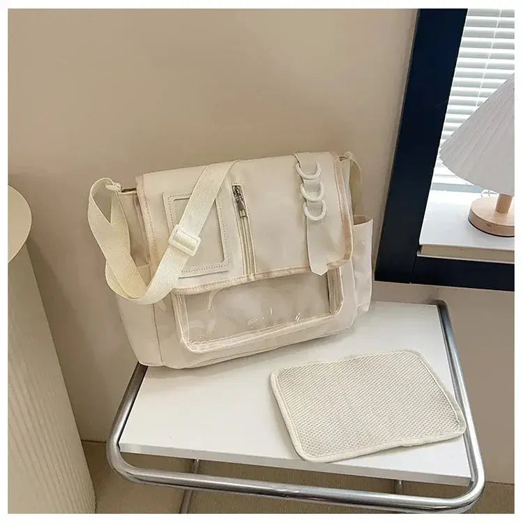 Y2K Harajuku ita bag in cream with clear vinyl window and adjustable shoulder strap
