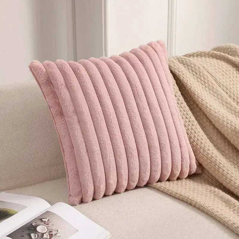 Pink faux rabbit fur cushion cover with plush ribbed texture for sofa decor