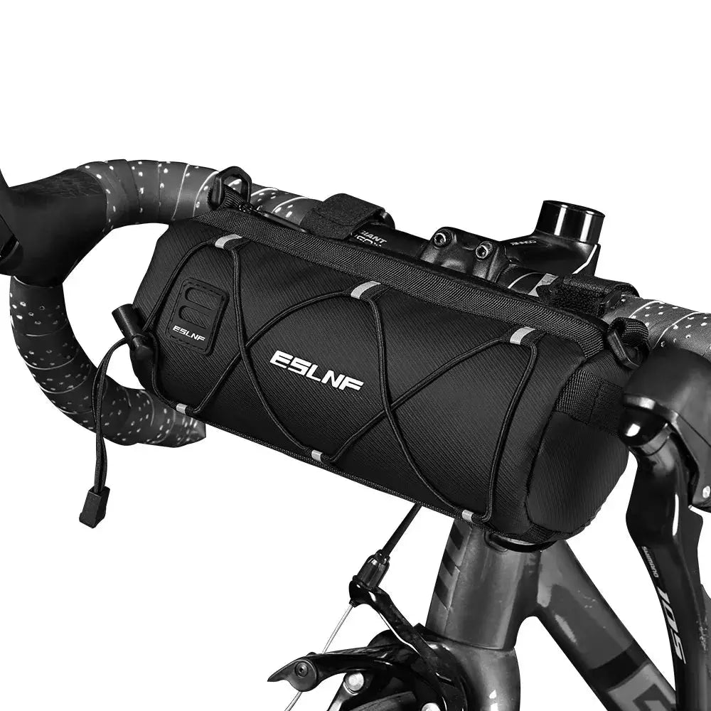 Close-up of OFFBONDAGE waterproof bike front bag mounted on a bicycle handlebar for cycling adventures.
