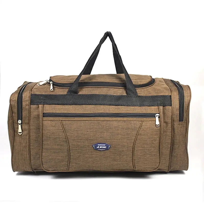 Oxford waterproof travel duffel bag, brown fabric with black handles and front zip pocket; X-Sport badge.