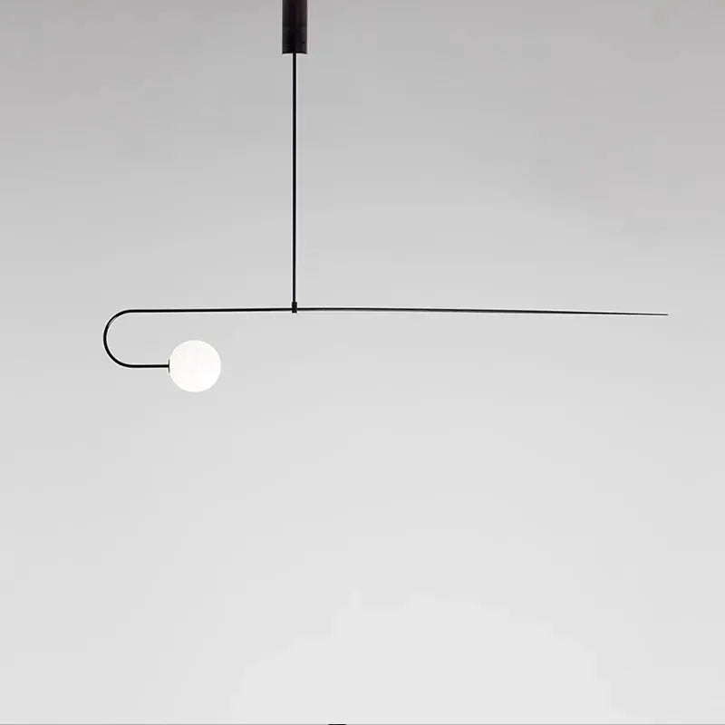 Nordic minimalist chandelier by Simples Market with geometric black metal line design and white globe bulb.