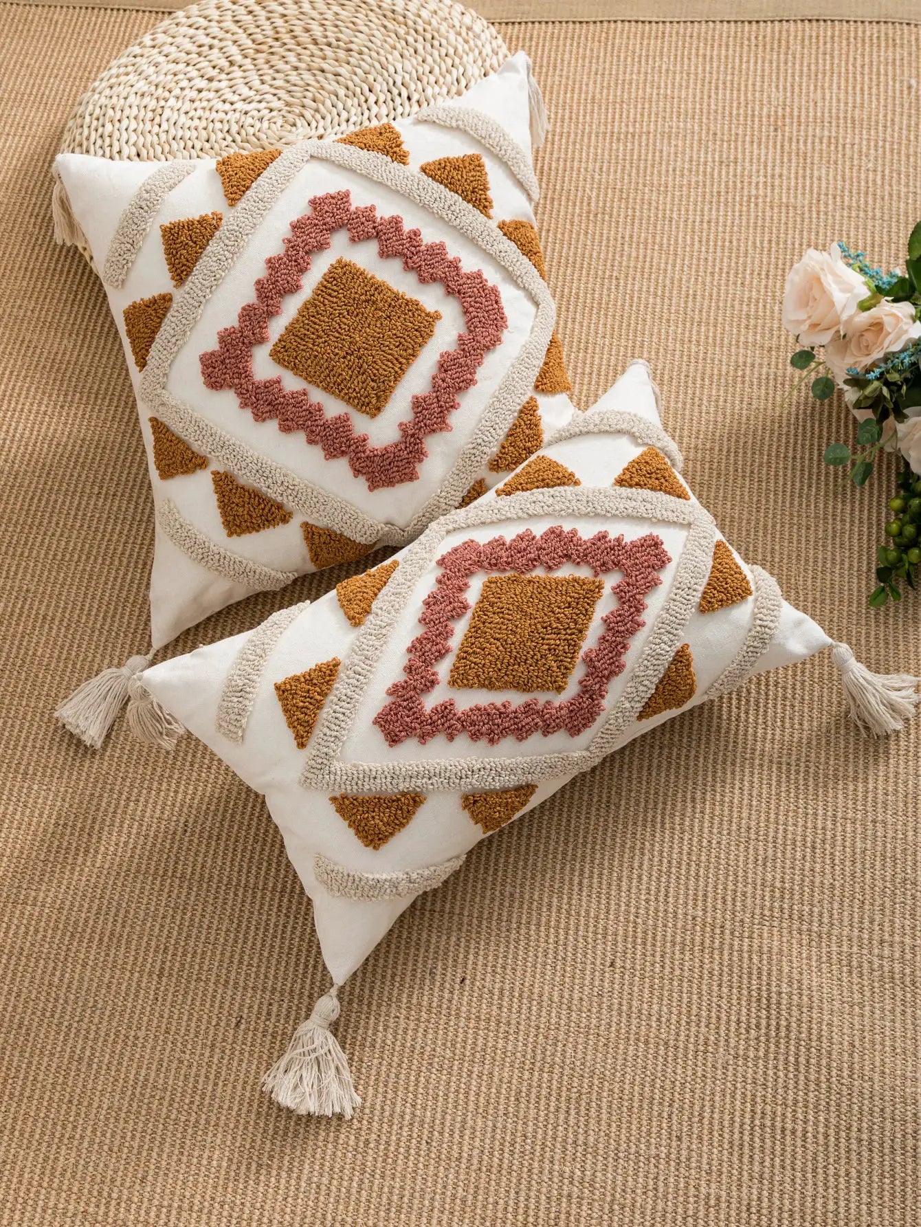 Geometric pillow cover set by Simples Market in bohemian loop velvet, white with orange and pink tufted diamonds (2 pcs).