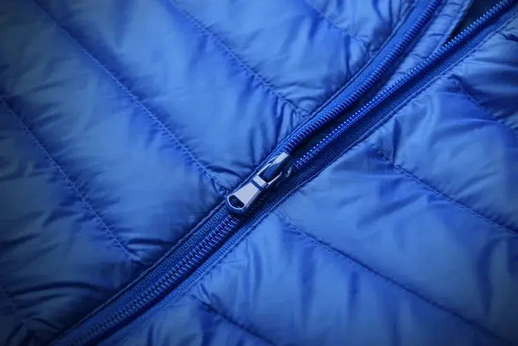 Men's ultralight blue down jacket by Simples Market with front zipper
