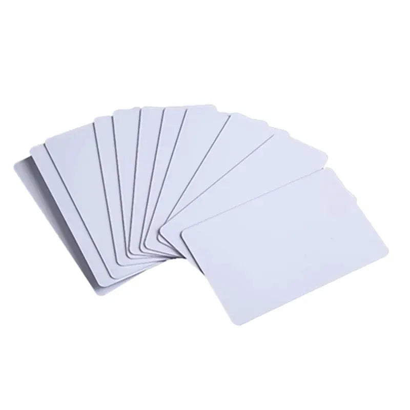 Rewritable RFID key cards set of blank white plastic cards fanned out.