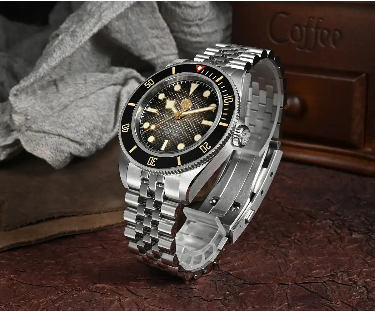 San Martin 40mm BB Diver watch with stainless steel bracelet, black bezel, and gold-tone markers.