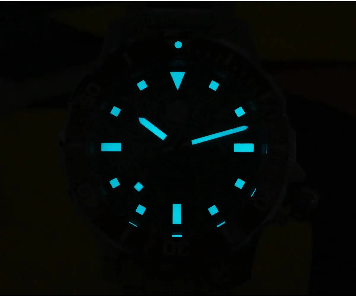 San Martin diver watch with glowing blue markers and hands in low light
