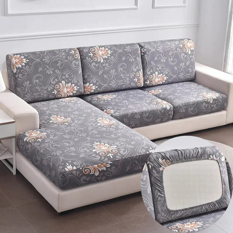 Simples Market stretch couch cushion slipcovers in gray floral pattern with peach accents for sofa cushions