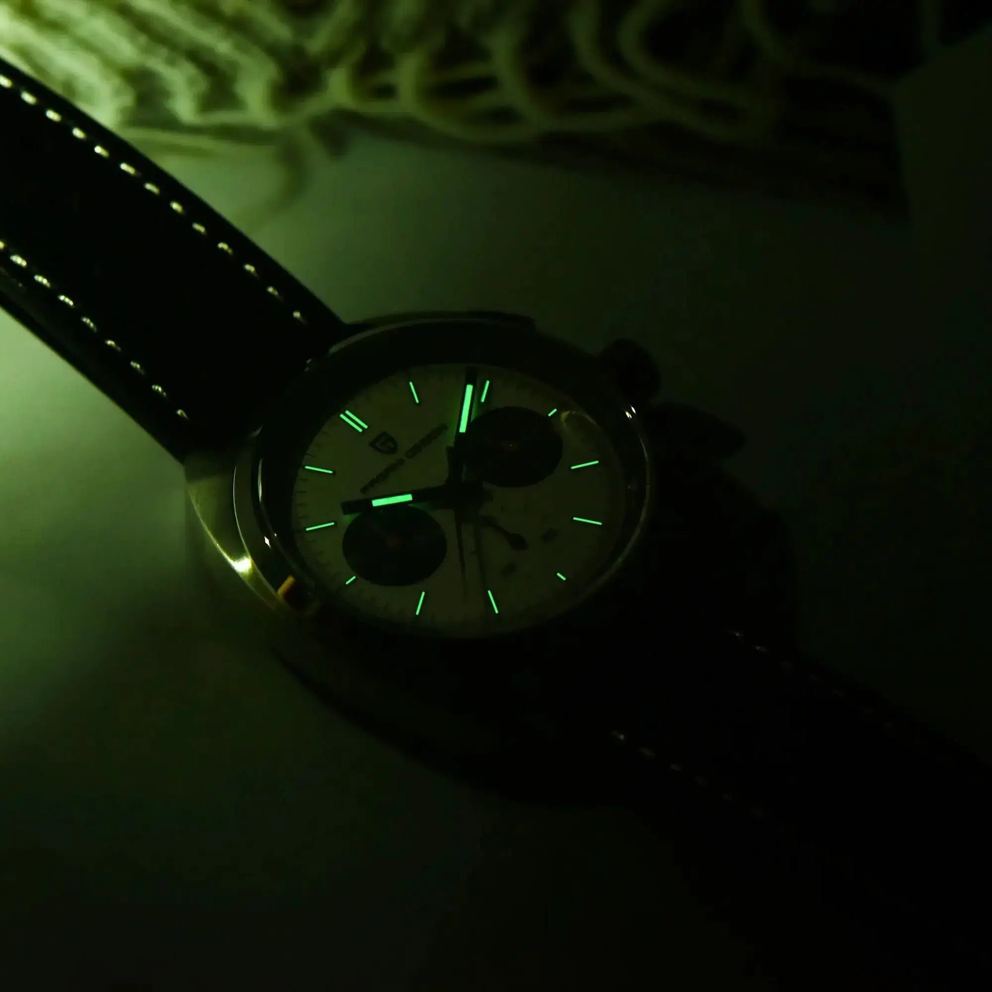 PAGANI DESIGN Panda Dial men’s wristwatch with green luminous indices and black stitched strap