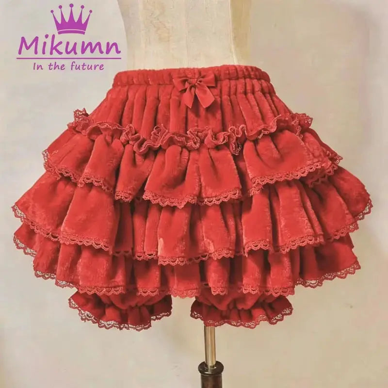 Red tiered lantern shorts with lace trim and bow at waist Mikumm