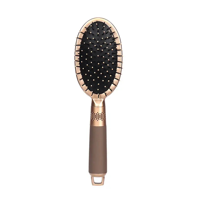 Detangling hairbrush by Simples Market; rose-gold framed oval brush with black bristles and brown handle for dry, wet, curly hair.