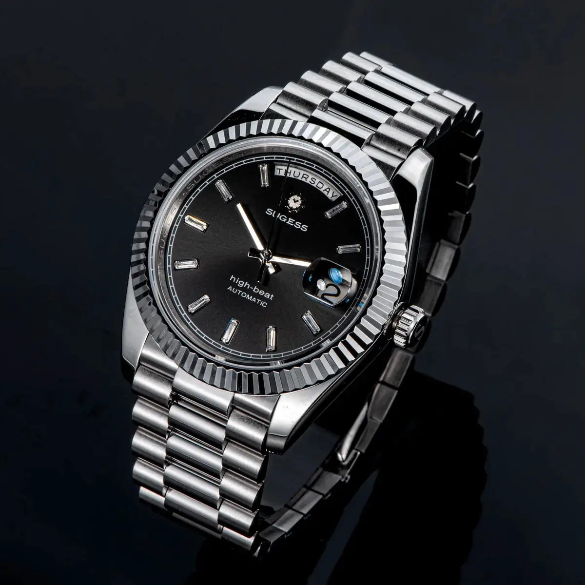 Sugess men's stainless steel automatic wristwatch with black dial, day/date window, silver bracelet