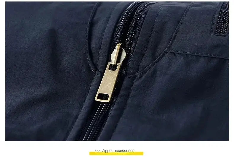 Simples Market outdoors heated gilet for men, navy vest with brass zipper close-up