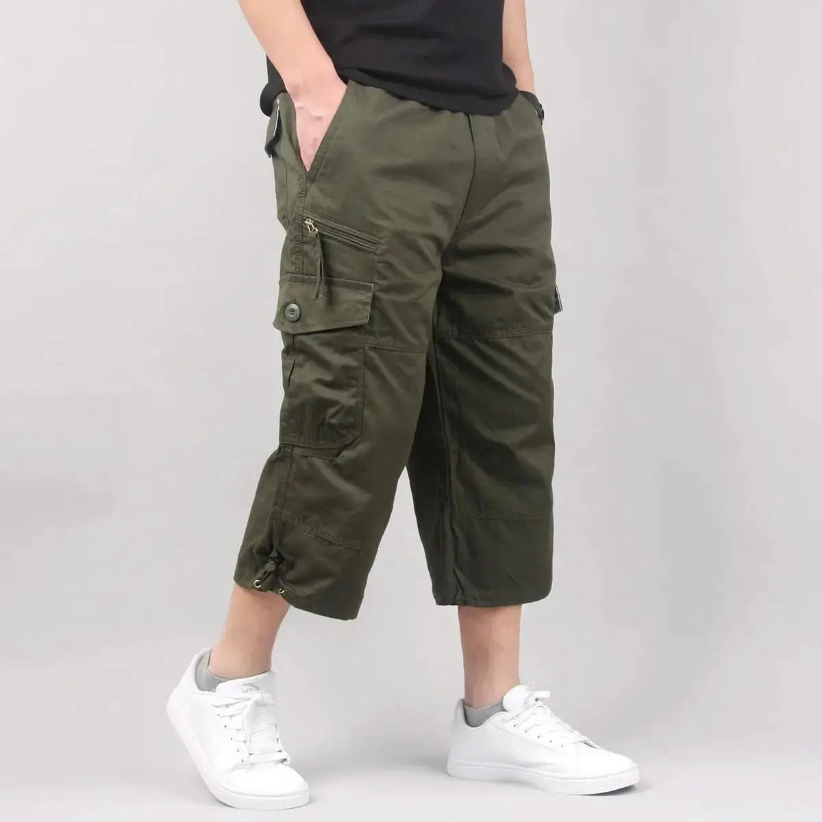 Men's cargo shorts olive green with multiple pockets, mid-calf length