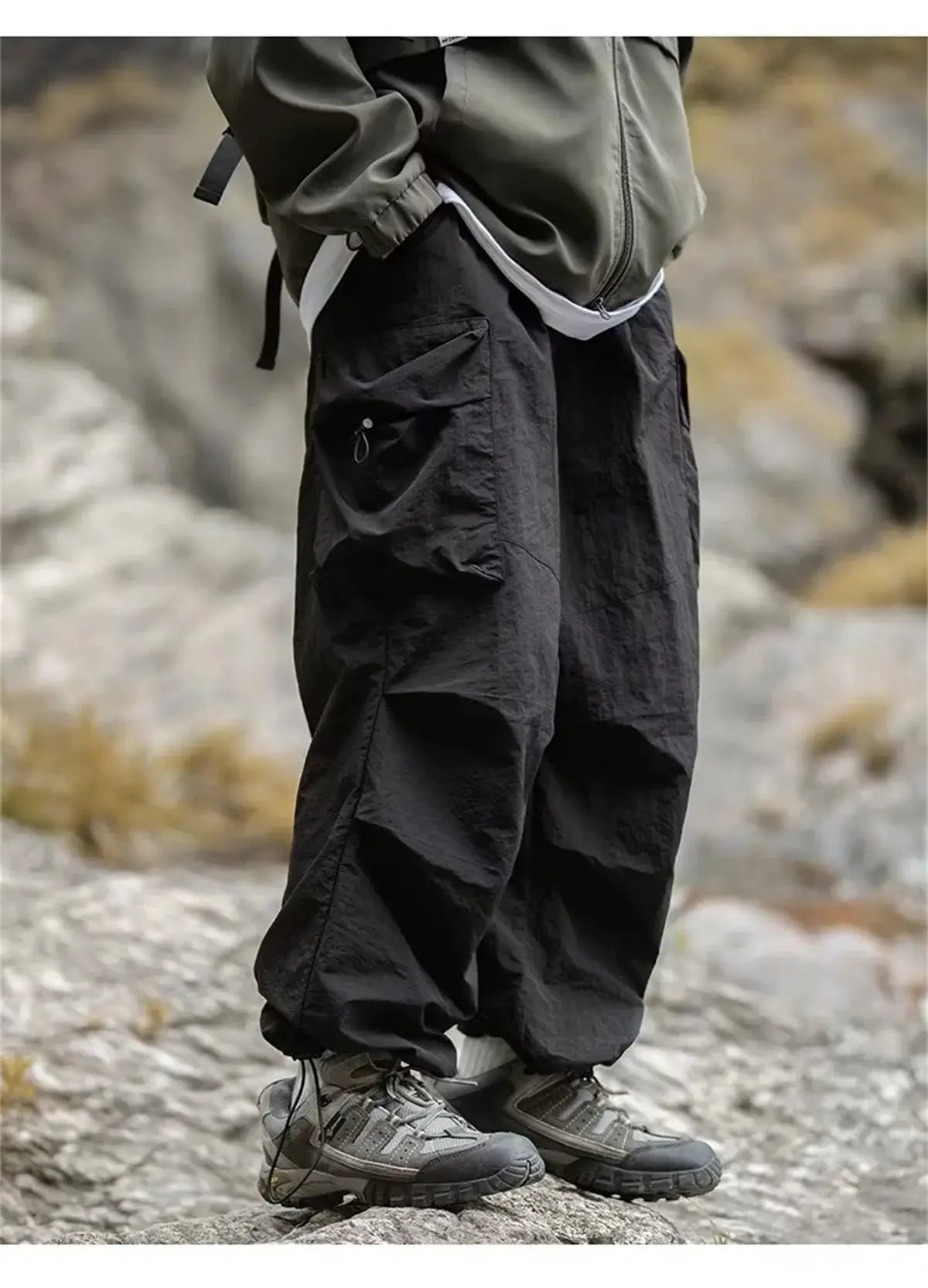 Men's black waterproof cargo hiking pants with large pockets