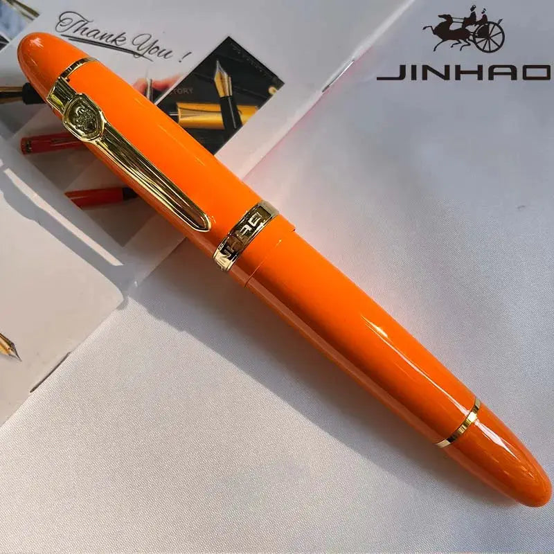 Jinhao 159 orange fountain pen with gold clip and silver trim, converter included
