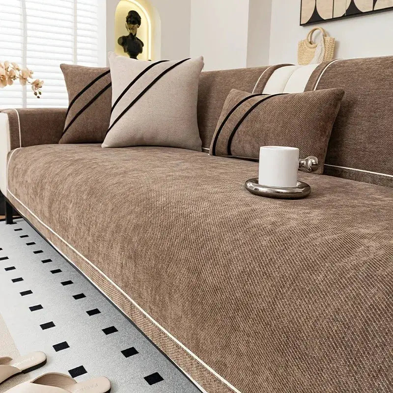 Heavy Non-Slip Sofa Protector Classic by Simples Market in brown chenille with decorative stitching on a sofa