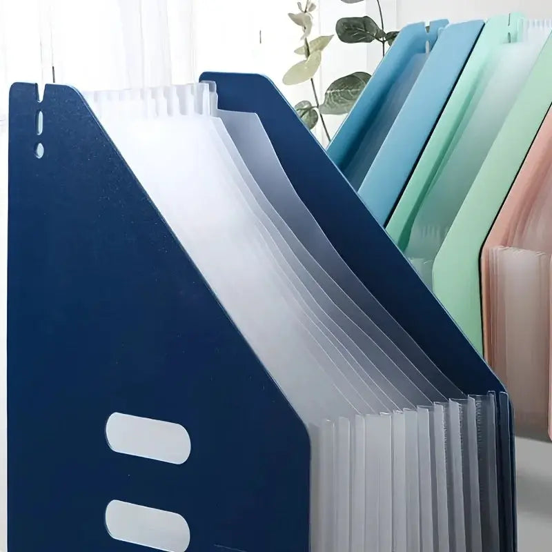 Foldable A4 file storage box with multiple pockets; navy blue front organizer and pastel color variants.