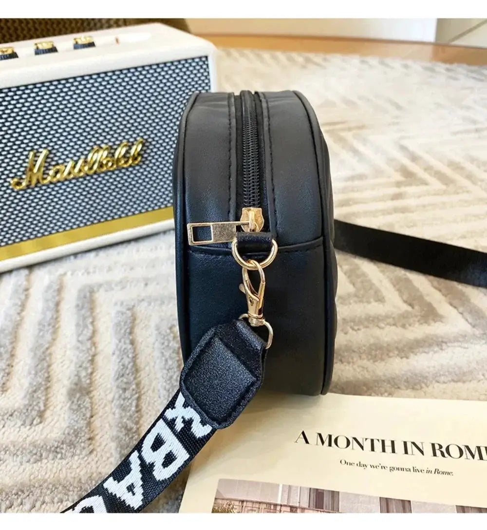 Shoulder bag, black PU leather with top zipper and detachable strap
