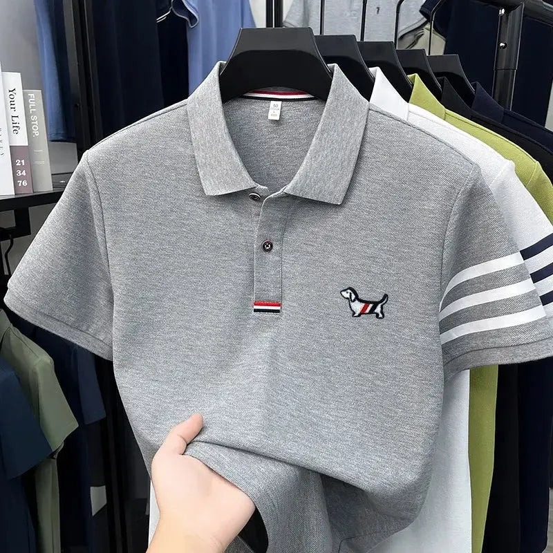 Simples Market gray polo shirt with embroidered dog logo and striped sleeve cuffs