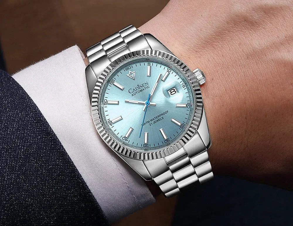 Cadisen men's stainless steel automatic watch with blue dial, date window with magnifier, 100m waterproof.
