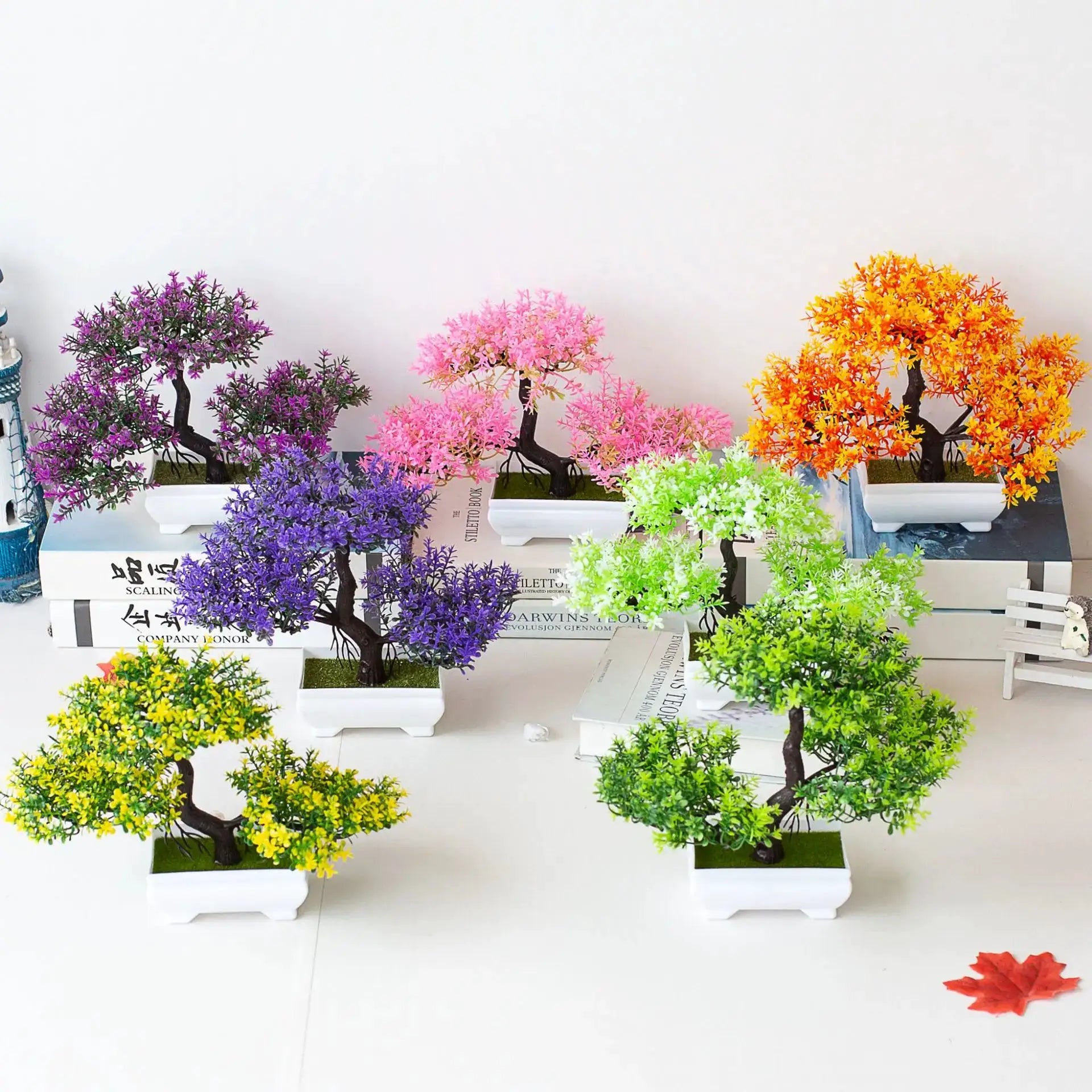 Artificial bonsai tree set by Simples Market in white pots; colorful purple, pink, yellow, orange and green faux plants