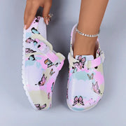 Women indoor slippers mule clogs by Simples Market in pastel butterfly print, soft EVA, anti-slip for home.