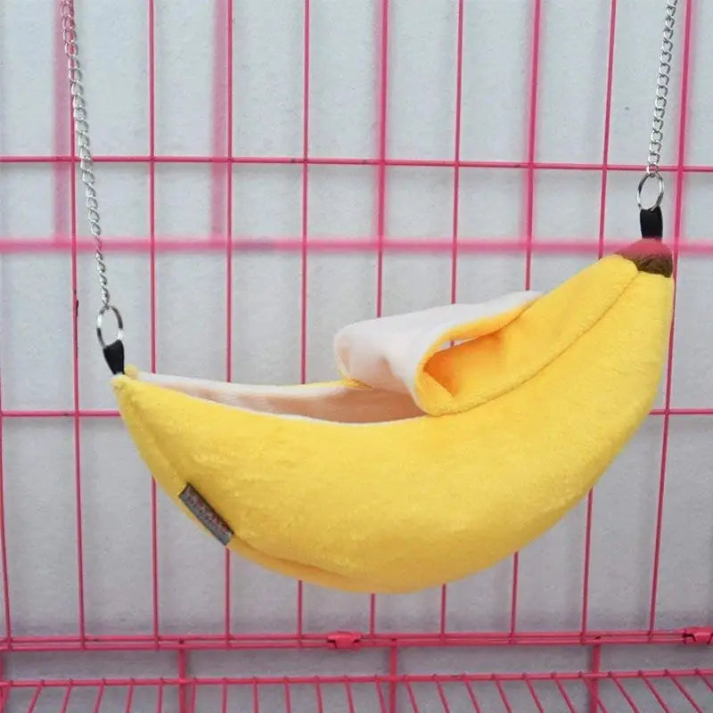 Banana-shaped hamster bed hammock in yellow plush with white lining, Simples Market