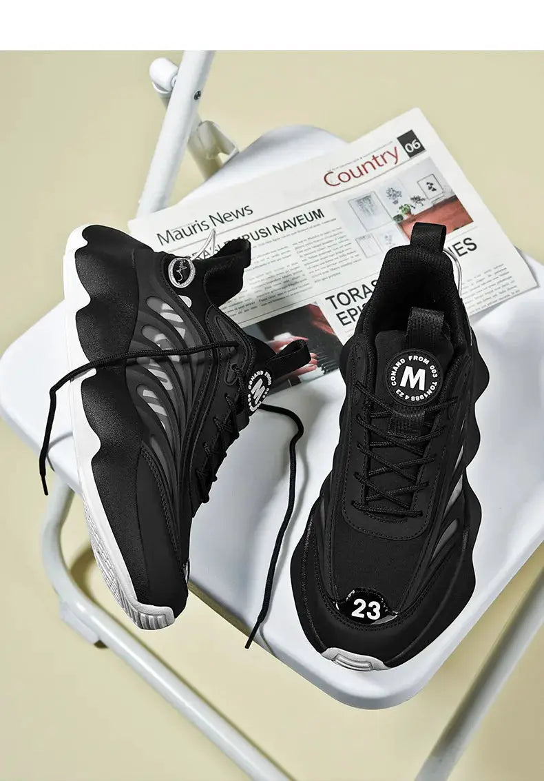 Pair of men's black running sneakers with white outsole and lace-up design
