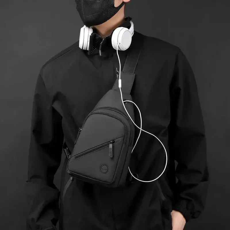 Lightweight men's chest bag in black nylon by Simples Market, crossbody sling with front zip pocket