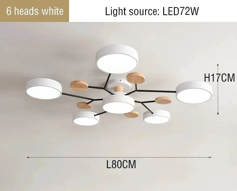 Modern LED chandelier for living room with 6 white drum heads, black metal arms and wood accents by Simples Market