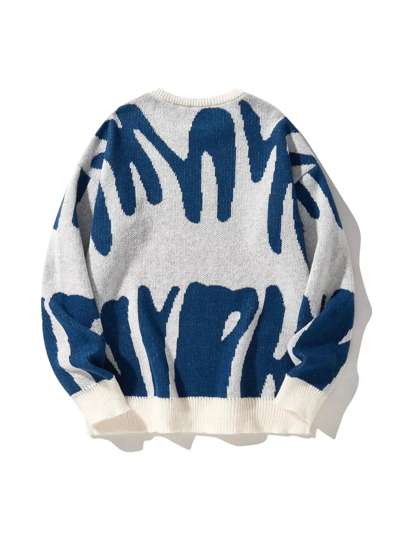 Men's knit pullover sweater with irregular blue jacquard pattern on white, round neck, ribbed cuffs and hem.