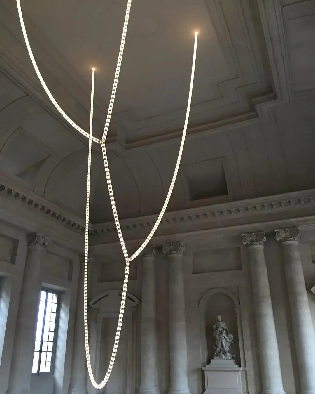 Necklace chandelier ceiling light by Simples Market with multi-strand crystal acrylic bead chains and adjustable length.