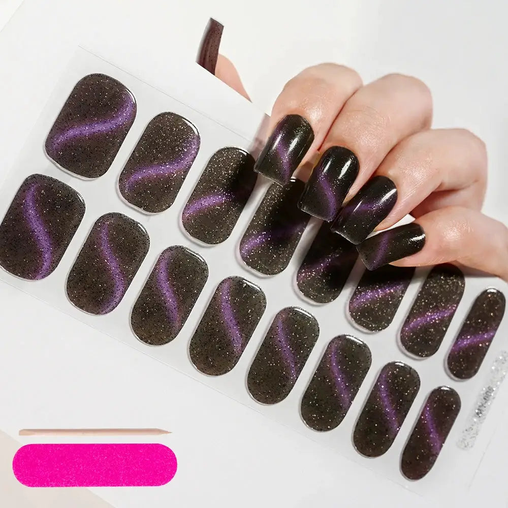 Semi-cured gel nail wraps by Simples Market in dark brown with purple diagonal swirl and glitter on a sheet