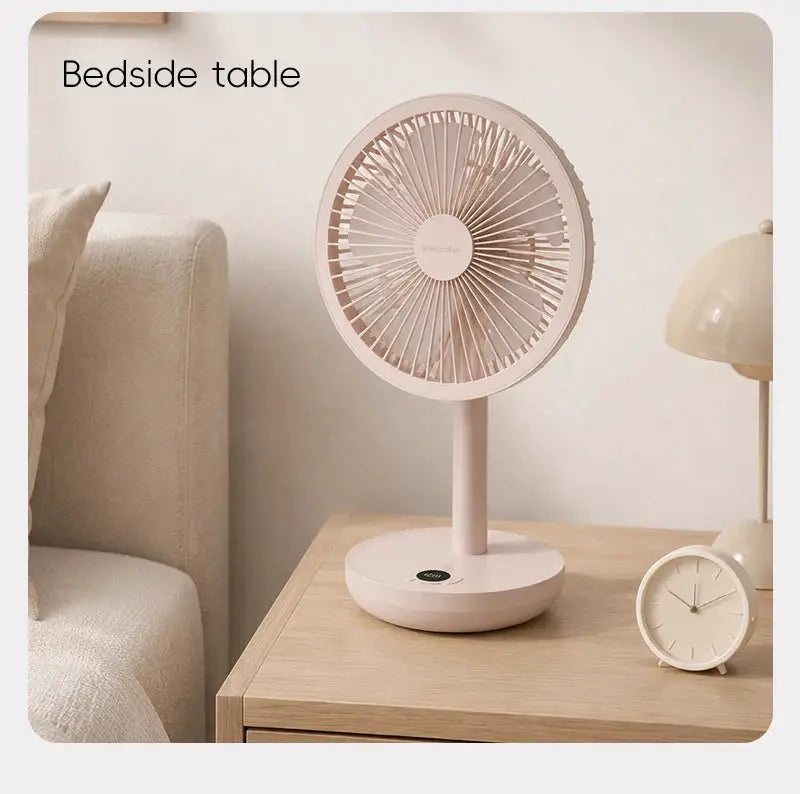 KINSCOTER Smart Oscillating Desk Fan by Simples Market, pink beige USB rechargeable desk fan on a bedside table
