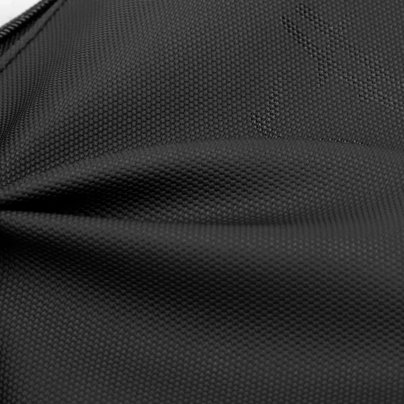 Unisex waist bag fabric close-up in black by Simples Market