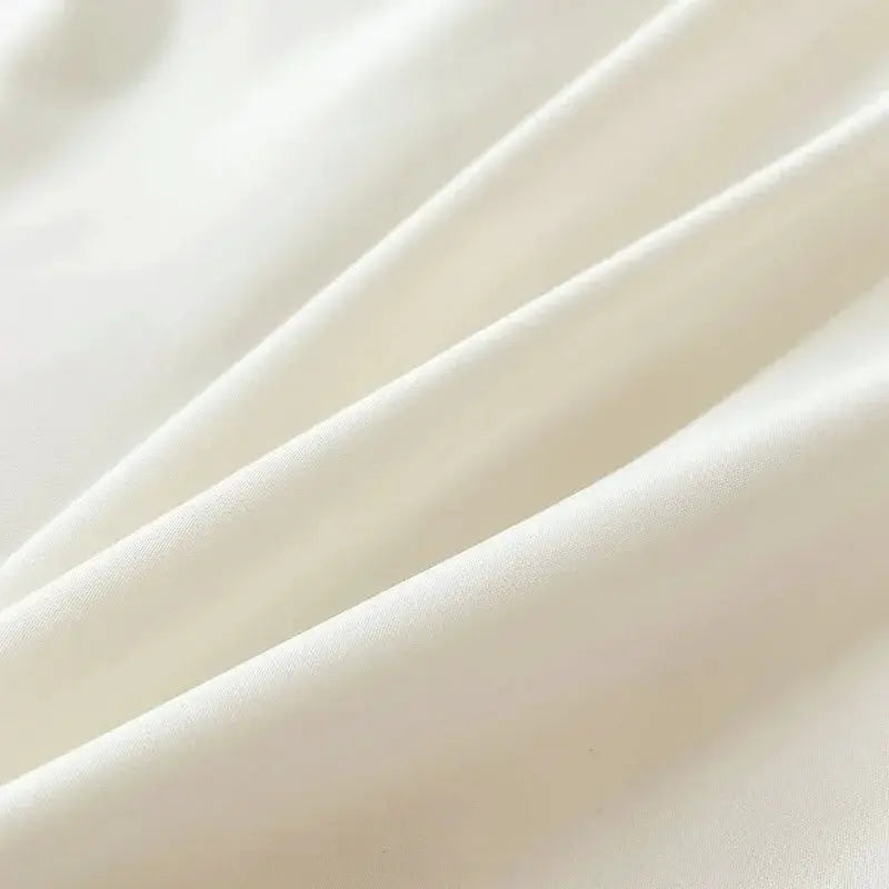Duvet cover bedding set 4-piece fabric close-up in solid cream brushed texture, Simples Market