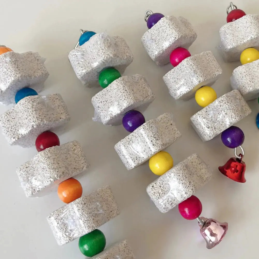 Volcanic rock bird chew toy with colorful beads and bells for parrots and hamsters Simples Market