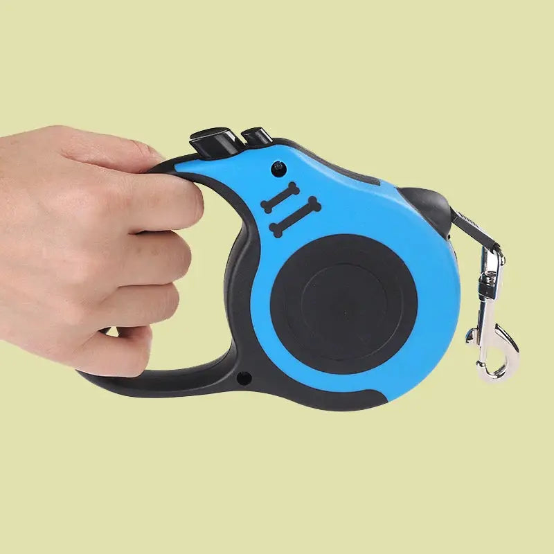 Retractable dog leash, blue and black nylon lead with hand grip and metal clip